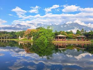a view of a lake with a gazebo at Erfen De Homestay in Guanshan