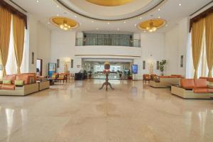 The lobby or reception area at Royal Sarovar Portico Siliguri