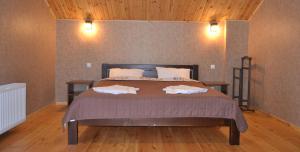 Postel nebo postele na pokoji v ubytování Bilovoddya Hotel