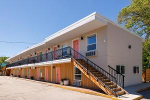 a building with a staircase on the side of it at Lakeside Villa & Nordic Spa in Penticton