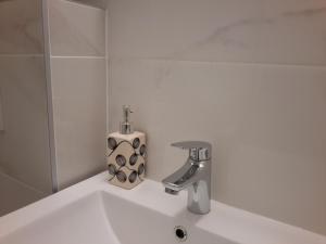 Kúpeľňa v ubytovaní Haustor Apartments + 31 fotografií