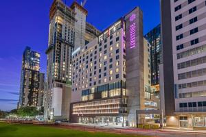 a rendering of a hotel in a city at night at Cambria Hotel Austin Downtown in Austin