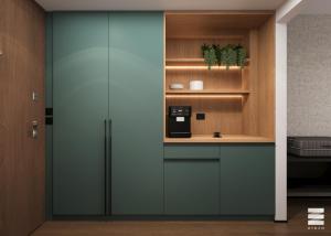 a kitchen with a cupboard with a coffee maker at Tailormade Hotel Median Niš in Niš +16 photos