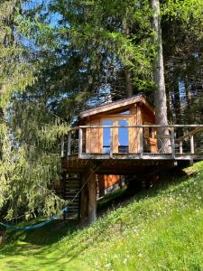 a tree house in the woods on a hill at Entre les Arbres in Saint-Jean-d'Aulps +38 photos