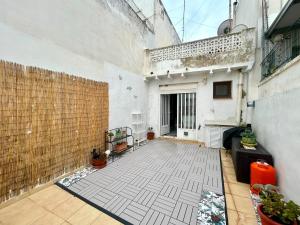 a room with a courtyard with a building at Casa De Pueblo Raval in Teulada