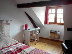 Un pat sau paturi într-o cameră la Gite duplex du vignoble Alsace