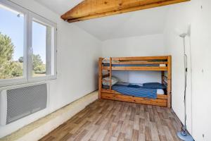 a room with a bunk bed and a window at Domaine De Bellerose in Cadeillan +16 photos