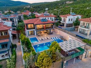 an aerial view of a house with a swimming pool at VILLA ALKIM in Kaş