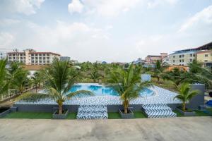 an image of a swimming pool at a resort at PP Garden Home in Sathani Lat Krabang