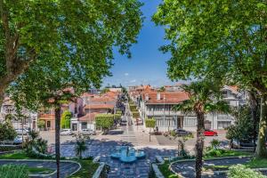 a view of a city street with trees at Appartement Le Mauresque in Arcachon