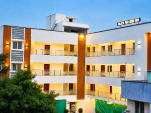 an external view of a building at Raja's Paradise Inn in Chennai