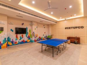 a ping pong room with a ping pong table at The Hosteller Gurgaon in Gurgaon