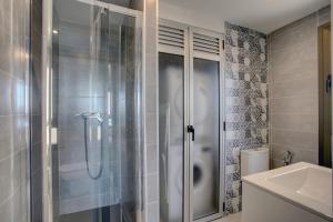 a bathroom with a shower and a toilet and a sink at New Luxury Premium in Málaga +59 photos