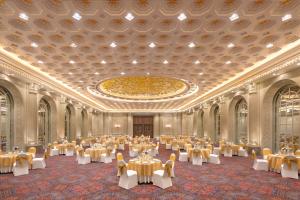 a banquet hall with tables and chairs and a ceiling at Welcomhotel by ITC Hotels, Dwarka, New Delhi in New Delhi +36 photos