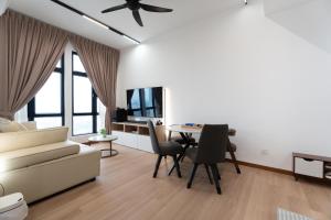 a living room with a couch and a table at Space Residency 2 bedroom 2 bathroom B59-11 in Johor Bahru