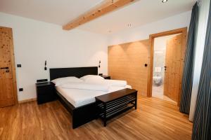 מיטה או מיטות בחדר ב-Hotel Angerer +65 תמונות