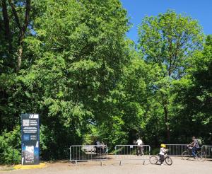a group of people riding bikes in a park at Pop Up Village in Villasanta