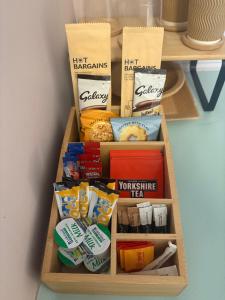 a wooden box filled with different types of food at Carnegie Lodgings, Tain in Tain