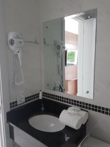 Koupelna v ubytování Itacolomi Hotel
