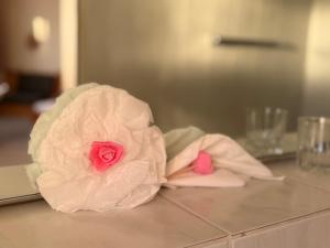a flower made out of paper on a counter at In & Out Boardinghaus in Stolberg +23 photos