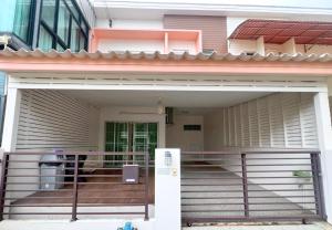 a house with a front porch with a fence at Walking distance Thunder Dome in Ban Bang Phang