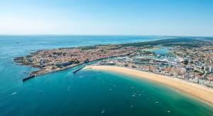 an aerial view of a beach and the ocean at L'Escale Sablaise in Les Sables-d'Olonne