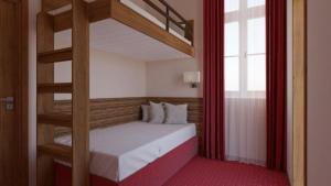 a bedroom with a bunk bed with a ladder at EA Hotel Sonata in Prague