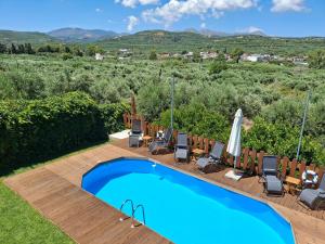 an image of a swimming pool in the backyard of a villa at Terra Solaris Guesthouse in Kissamos