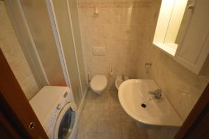 Łazienka w obiekcie Riva Beach Apartment
