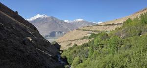 a view of a valley with mountains in the background at Eraj Bibi Fatima in Yamchin