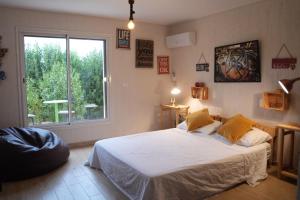 a bedroom with a large bed and a window at Casa Biba in Utique +55 photos