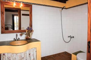 a bathroom with a sink and a shower at Salazar in Mazo