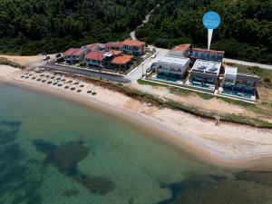 an aerial view of a resort on the beach at NikolaosMare in Nea Potidaea +62 photos
