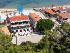 an overhead view of a building next to the beach at NikolaosMare in Nea Potidaea