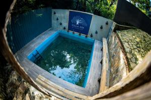 an overhead view of a plunge pool with water in it at Villa D55 - A Private Villa with Character & Comfort in Kandy