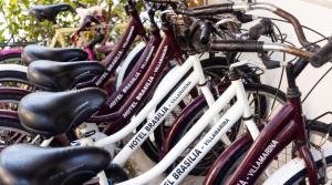 a row of bikes parked next to each other at Brasilia Sweet Home in Cesenatico +32 photos