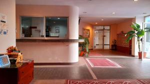a living room with a counter and a kitchen at Sport Villa Condo in Hua Hin +32 photos