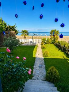 a bunch of balloons are hanging over a garden at NOVA PORT Boutique Hotel in Tekirdağ