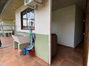 a room with a kitchen with a sink and a counter at La Villa Study & Relax Apartment in Los Santos +2 photos