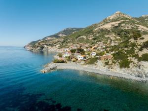 an aerial view of a small island in the ocean at Acqua e Sale in Pomonte