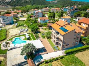 an aerial view of a resort with a swimming pool at Lopar Family Residence 543a in Lopar
