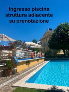 an image of a swimming pool at a resort at Le Felci Suite in Fiuggi