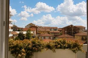 a view of a city from a balcony at GM House - Appartamento luminoso con grande terrazza vicino Torino in Collegno