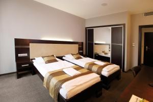 Posteľ alebo postele v izbe v ubytovaní Hotel Dolphin - Adult friendly