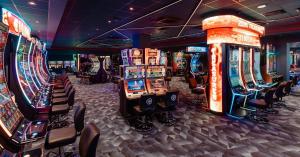 a room with many slot machines in a casino at Chambres d'Hôtes Manoir de Montecler in Chènehutte-les-Tuffeaux