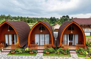 a rendering of a resort with three cottages at Bale Rinjani Lodge & Cafe in Tetebatu