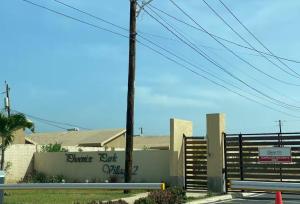 a building with graffiti on the side of it at Escape casa Ja in Portmore