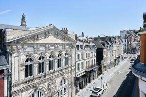 a view of a city street with buildings at L'étoile d'Arras in Arras