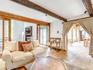 a living room with a couch and a table at The Barn - Uk51594 in Grantham
