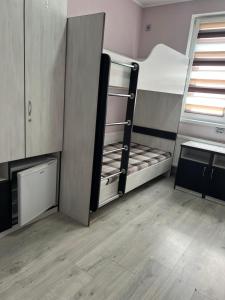 a room with two bunk beds in a room at Guest House MAX in Khmelnytskyi